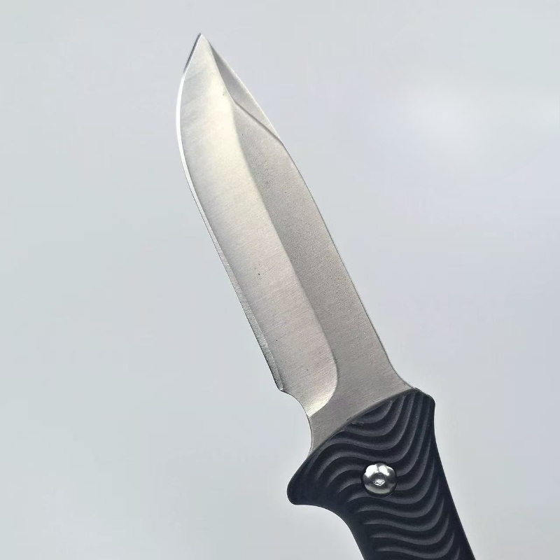 Nowy, zewnętrzny, karbowany, a – Dive Knife Titanium recenzja i cena